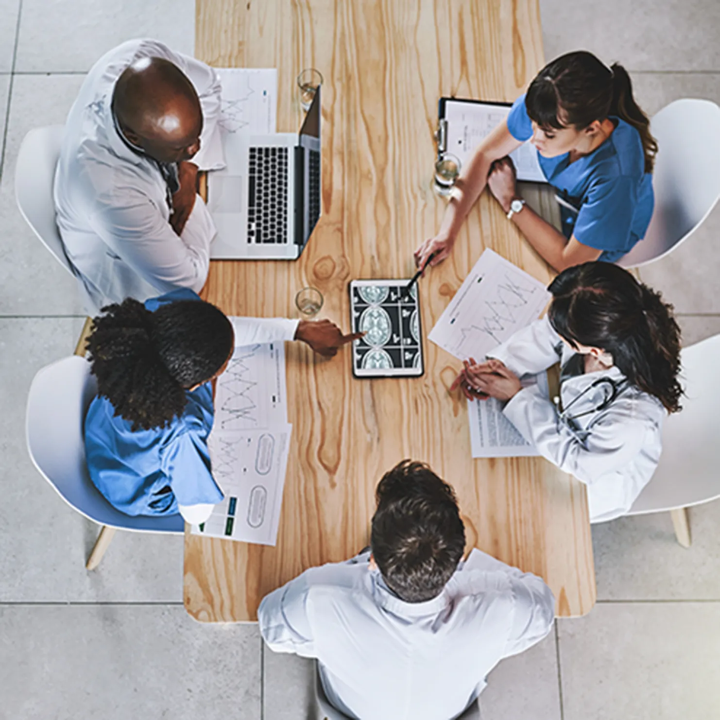 radiologists sitting at a table