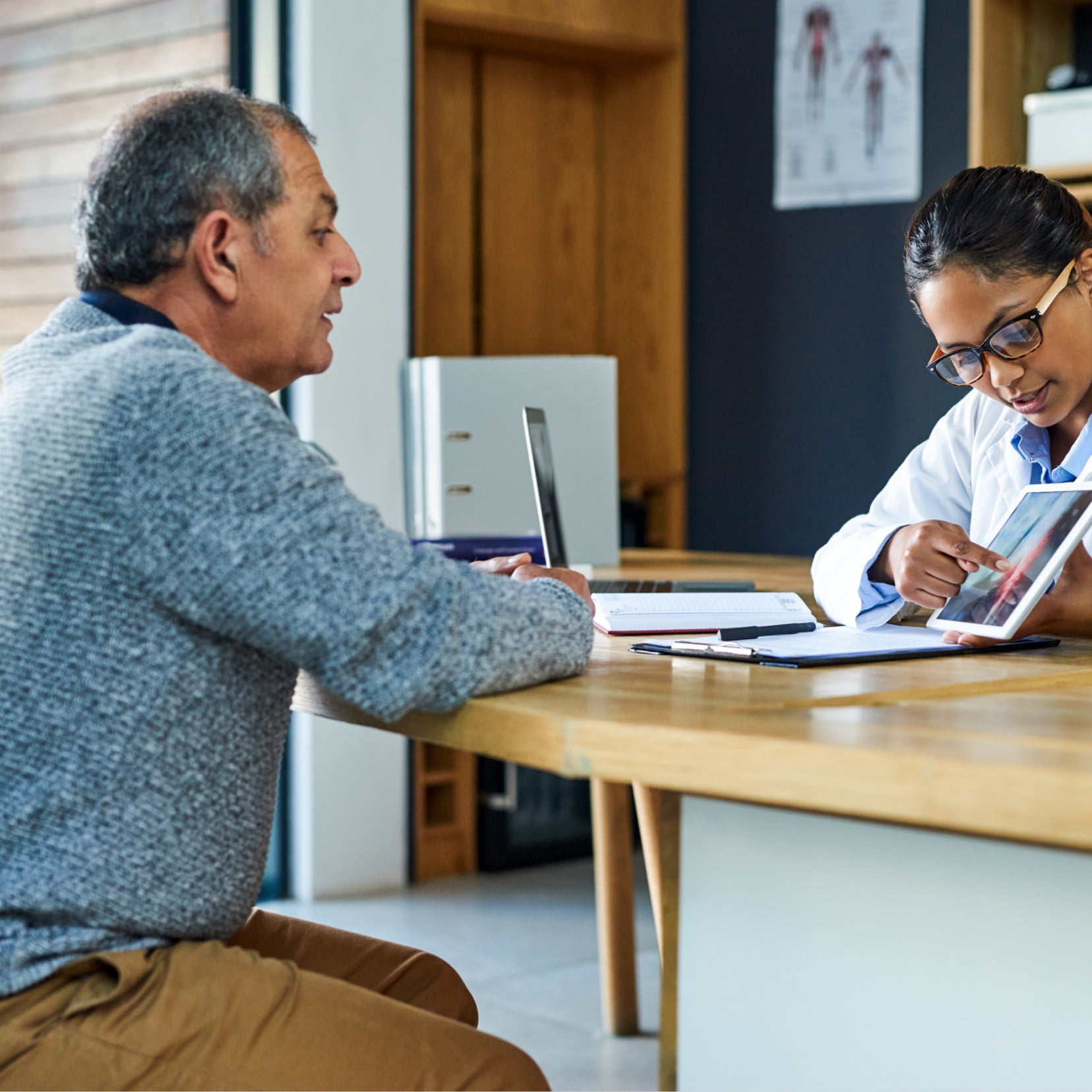 patient talking to radiologist